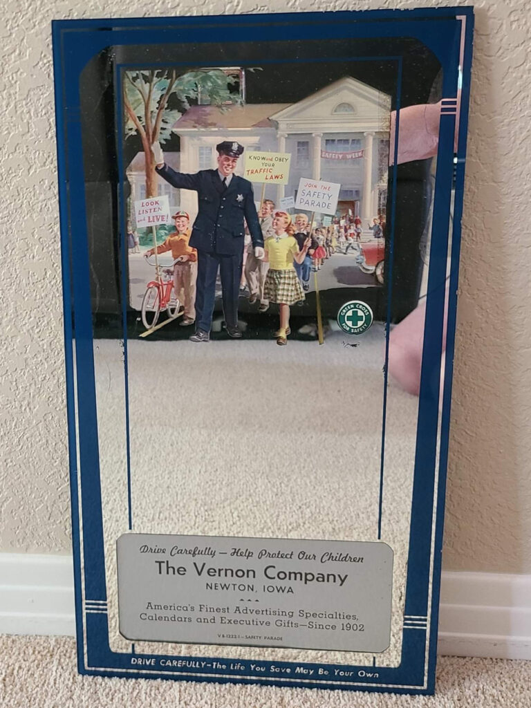 Vernon Company promo mirror. 