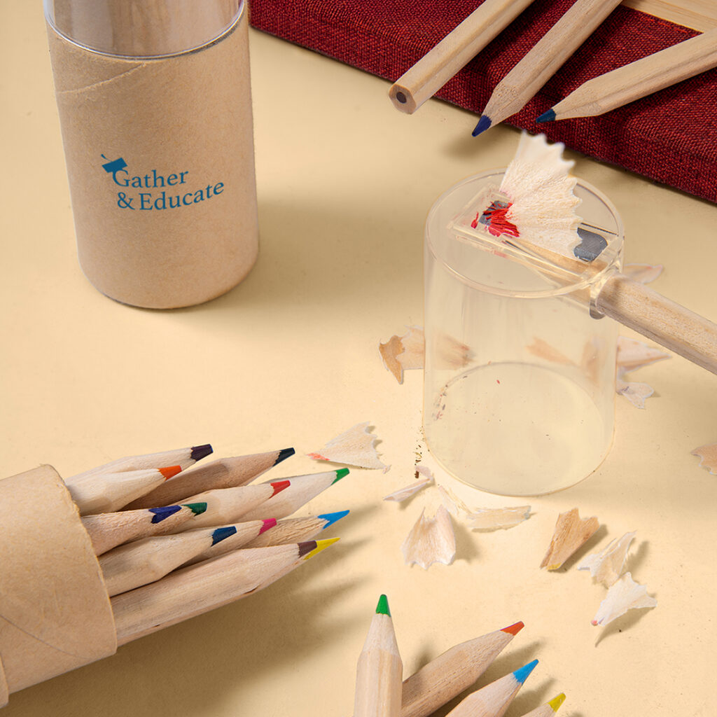 Two sets of colored pencils with a sharpener.