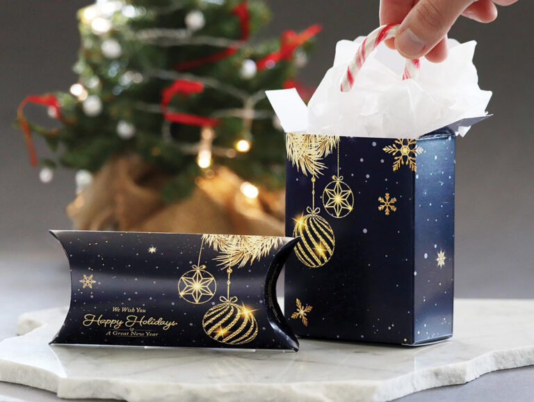 Holiday gift packaging scene with a decorated Christmas tree, blue and gold festive gift boxes, and candy canes being placed inside.