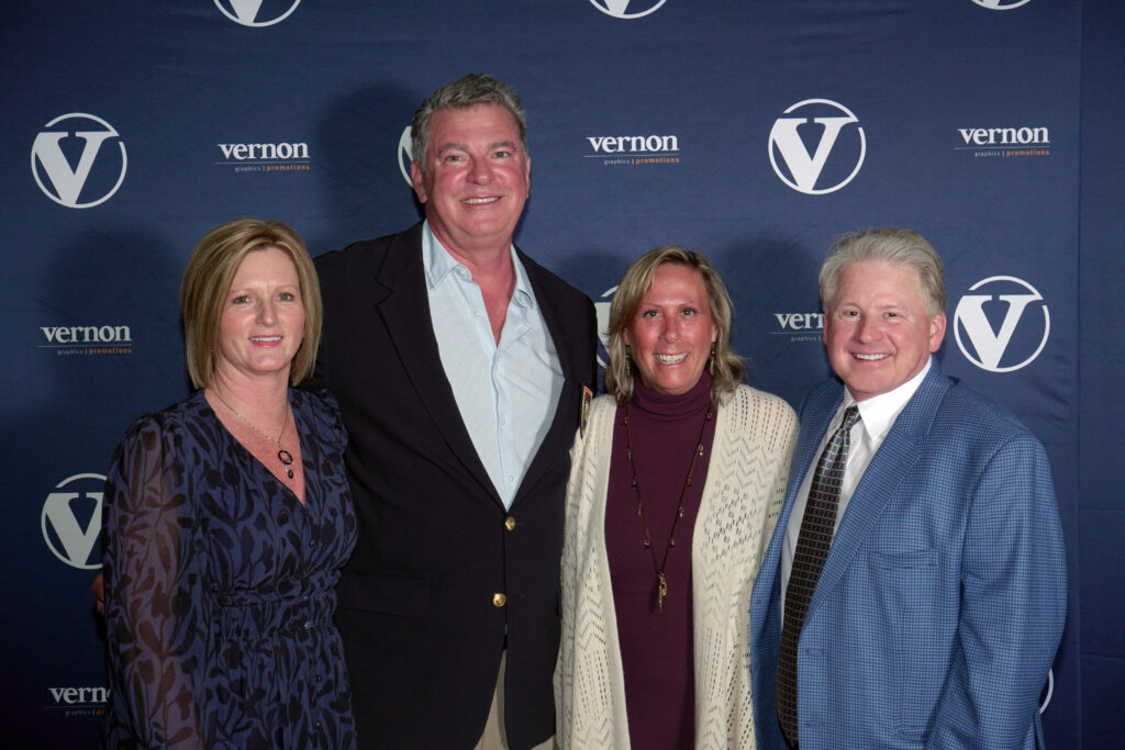 Burke Buchanan was named Account Manager of the Year at The Vernon Company’s 2026 National Sales Meeting, held at the Hyatt Regency in Dallas, Texas. Pictured from left: Vernon Director of Marketing Vicki Palm, Burke Buchanan, Lynn Buchanan and President and CEO Chris Vernon.