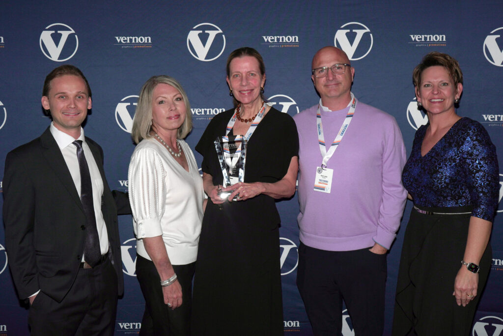 Gemline was named Supplier of the Year at The Vernon Company’s annual National Sales Meeting. Pictured, from left to right, Vernon’s Director of Strategic Relations Alex Vernon, Gemline’s Inside Sales Representative Niki Davis, Regional Sales Manager Beth Sheffer, Director of Sales Mark Lange and Vernon’s Vice President of Sales and Marketing Lisa Hubbard.