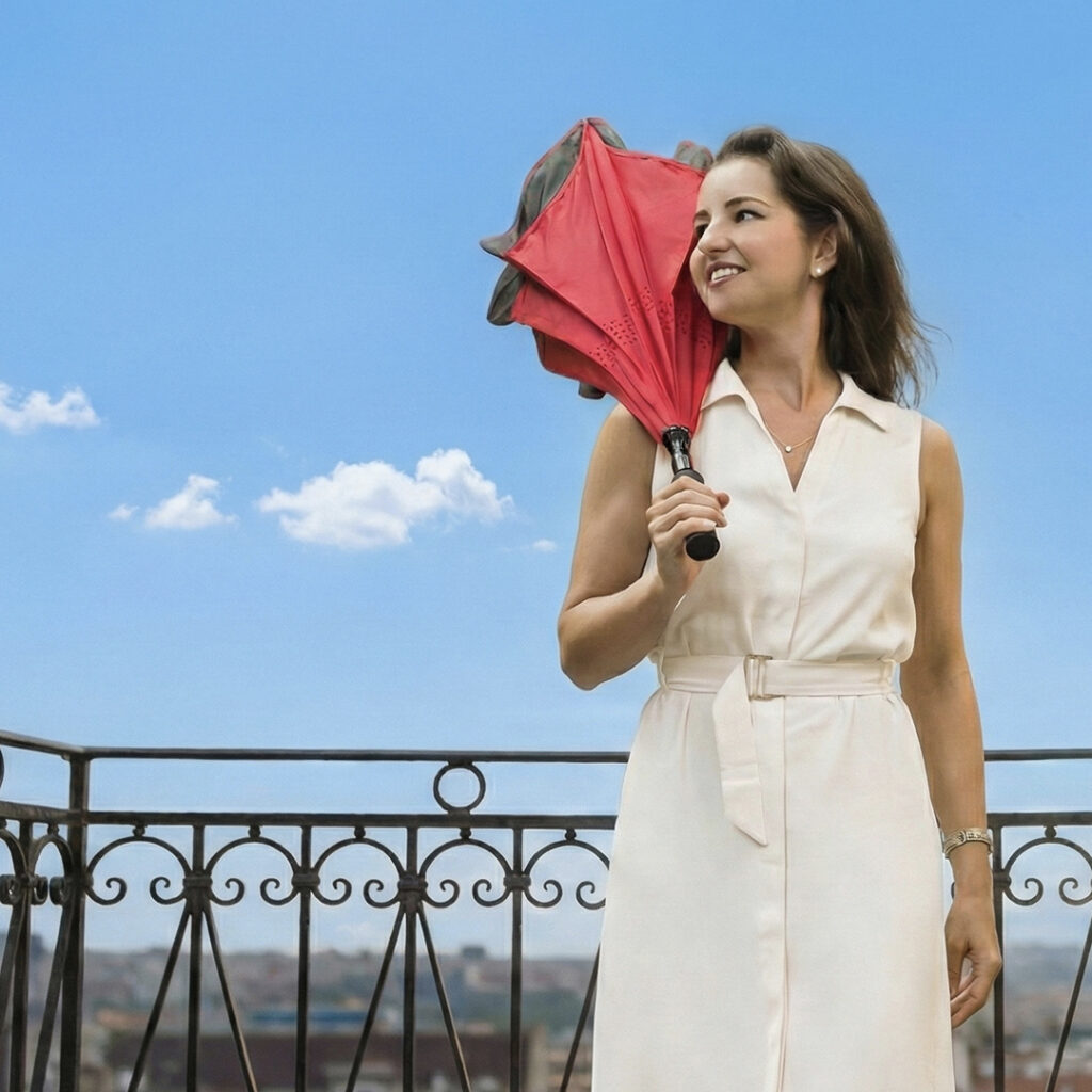 Red reverse umbrella designed for easy closing and drip-free use outdoors