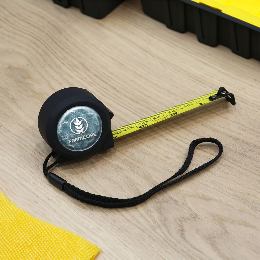Promotional tape measure with custom logo and extended blade, a practical branded tool for construction, maintenance, and home improvement tasks.