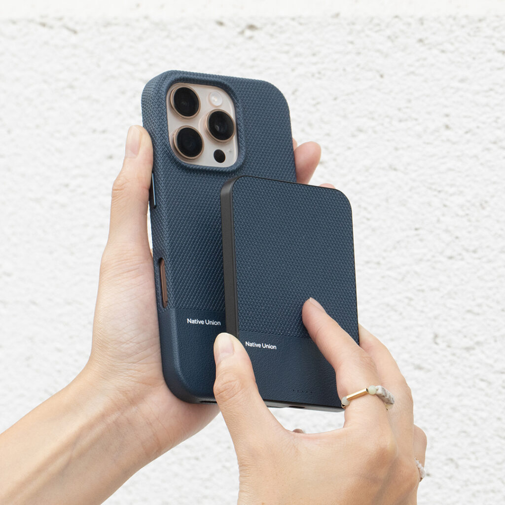 Smartphone with a matching magnetic power bank and protective case, representing popular branded tech accessories that recipients use daily.